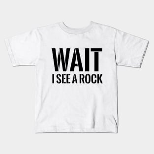 Wait, I see a rock t-shirt Kids T-Shirt